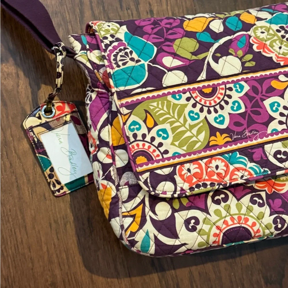 Vera Bradley Retired Messenger/Computer Bag in the Plum Crazy pattern.